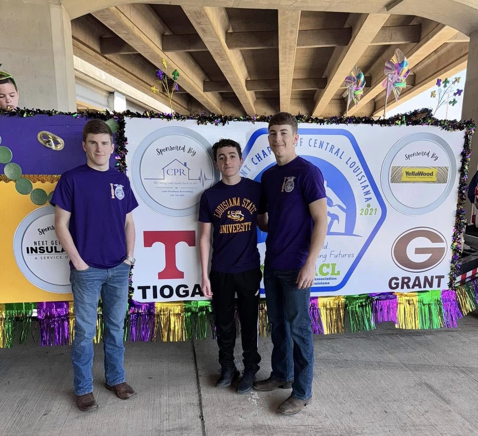 Students in front of the chapter Mardi Gras float