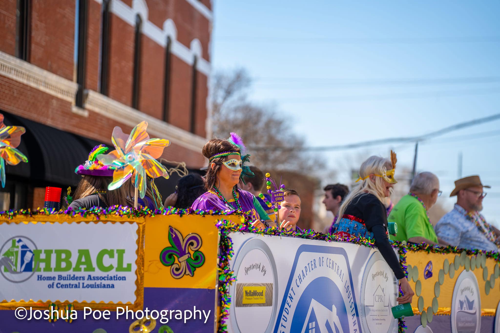 Students throwing beads